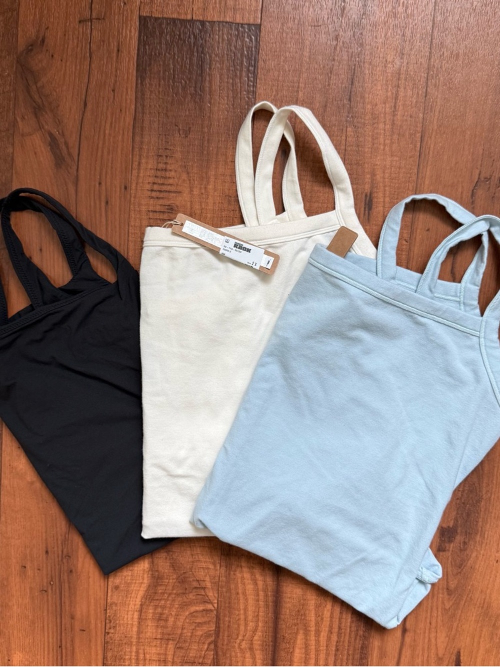 SKIMS Scoop Neck Tank Trio in Black, Cream & Light Blue